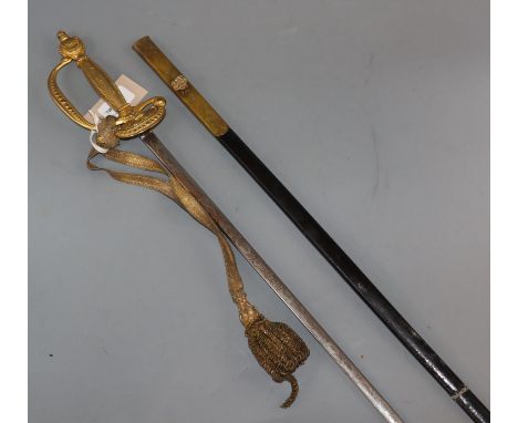 A Court sword having gilt metal hilt and etched blade, with frog, leather scabbard and outer case