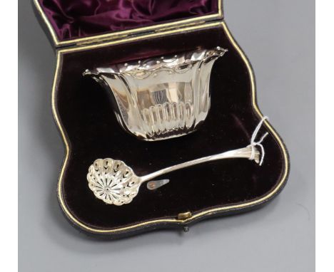 A late Victorian silver sifter, ladle and bowl christening set, in fitted leather case, London 1896