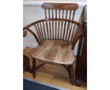 A pair of 19th century yew, ash and elm low stick-back armchairs with cow horn stretchers W.59cm