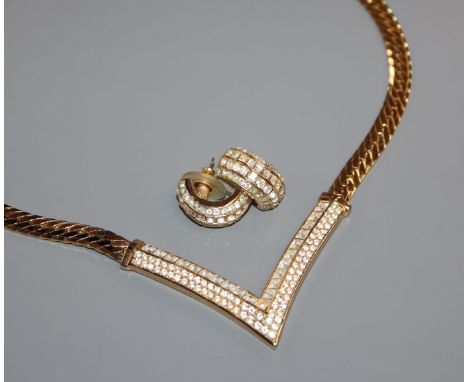 A Christian Dior chevron gilt metal and paste pendant necklace and matching earrings