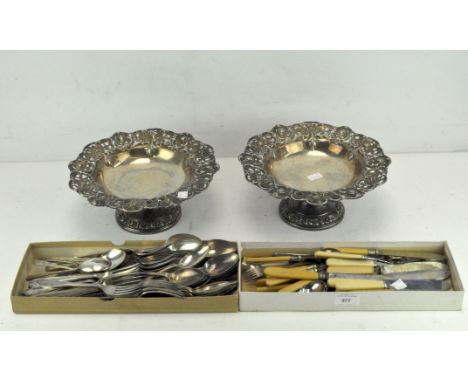 A collection of silver plated wares, to include two pierced and embossed fruit baskets by Walker &amp; Hall, Crane/Stork sewi