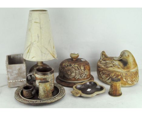 A group of Quantock stoneware table items including a cheese dome, duck casserole, salt and pepper pot, lamp and other exampl