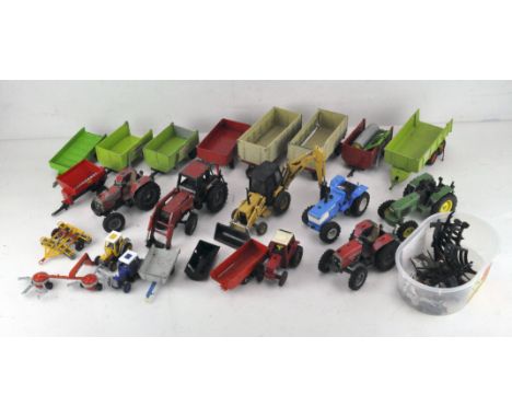 A collection of vintage toys, including Britains lead animals, model farm machinery including Ford TW-35 tractor, Massey Ferg
