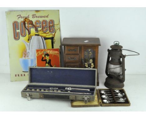 A boxed flute engraved Buisson and marked 3, together with a box of six EPNS spoons, a gas lamp, and other items