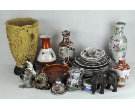 A group of Asian ceramics, comprising two lamp bases, assorted plates, jugs, large vases with Canton style decoration, a soap