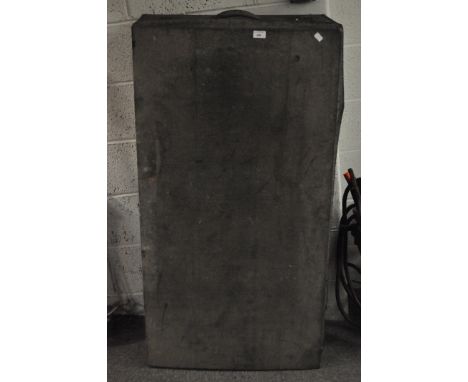 A large black canvas bound trunk, with leather handles to either side, 36 cm x 128 cm  x 66 cm