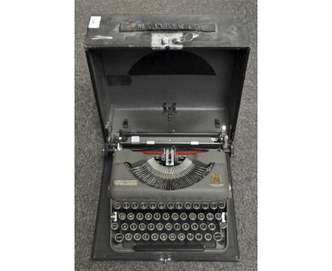 An early 20th century John Moore &amp; Beeson typewriter in original box