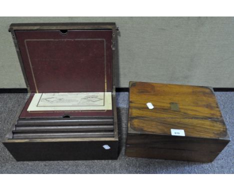 A 19th century rosewood brass bound writing slope and another later example, the first 29.5 cm x 22 cm