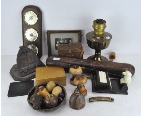 A large horn handled knife, together with a brass oil lamp, mounted thermometer and barometer, cigarette dispenser, pair of b