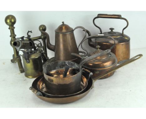A collection of brass and copper to include a blow lamp