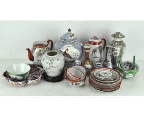 A group of 19th and 20th century Japanese and Chinese ceramics including a part Satsuma tea service. a small Imari vase, a li