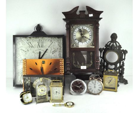 An assortment of desk, wall and carriage clocks, including a retro Metamec mantel clock and a Smiths alarm clock 