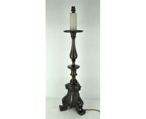 A 20th century brass electric table lamp, with scrolling details, supported on three cabriole feet, height 78cm