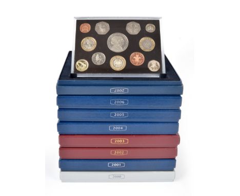 A collection of Royal Mint proof set coins, including; Elizabeth II, 2000, 'Millennium' £5 struck in c/n to 1 pence, (S PS65)