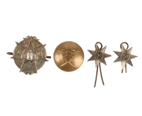 Iraq Police: a scarce silver cap badge and collar dogs, disc overlaid with seven pointed star, fort to the centre, collar dog