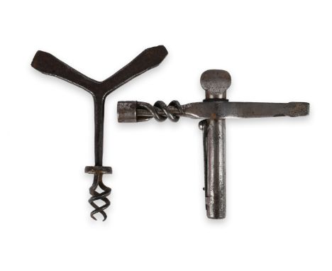 A combination tool for a percussion firearm, T-shaped, the upright with a nipple key at the base and an oiler with screw off 