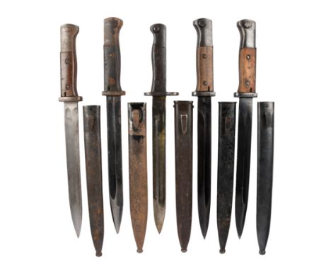 Four German K98 bayonets, blades 9 3/4 in. steel hilts with wooden grips and flask guards, steel scabbards; together with a S