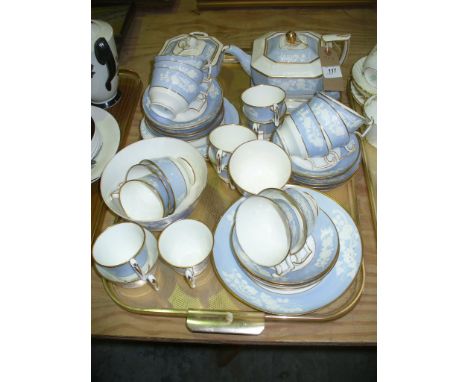 A 19th Century Copeland blue , white and gilt embossed tea service comprising teapot and sugar basin both with fruit finials 