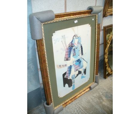 A Modern print of a Samurai within a gilt frame.