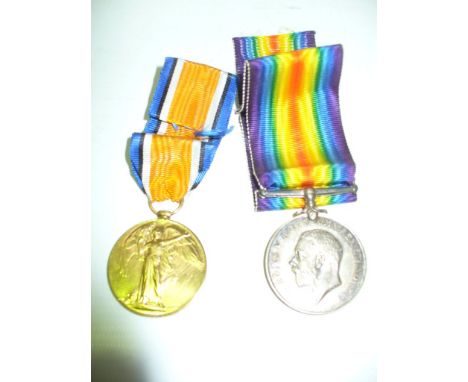 A First world war defence medal and second medal both with ribbons.(2)