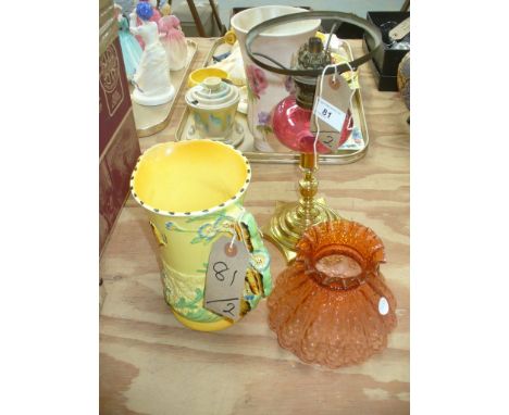 A Burleigh Ware jug , the handle moulded with flower heads and butterflies, a Victorian oil lamp with a cranberry glass reser