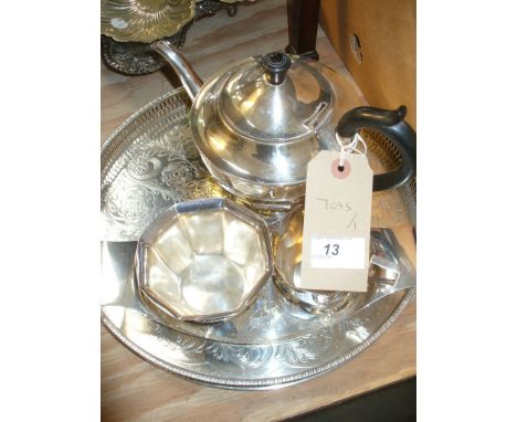 A Silver plated teapot , milk jug and sugar basin set and a galleried tray.