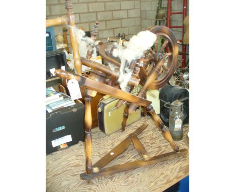 A Reproduction hardwood spinning wheel, a needlework firescreen and a framed print " The Lamplighter " signed in pencil A For