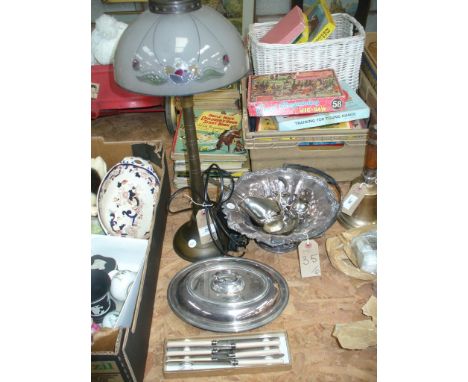 A Modern column table lamp, swing handled plated cake basket with a shell and scroll cast border, plated condiments, sauce bo