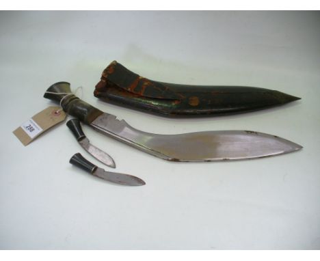 A Gurkha knife within a leather scabbard.