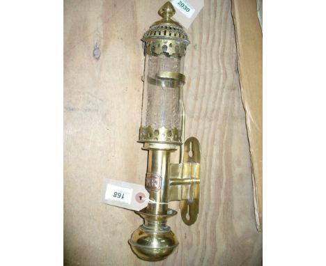 An early 20th Century Great Western Railway brass lantern 
The glass cylindrical shade, applied with a pierced gallery and up