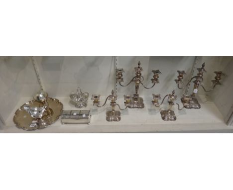 Plated wares, comprising; a shaped circular salver, a rectangular twin bottle inkstand, raised on four bun feet, a sugar bask