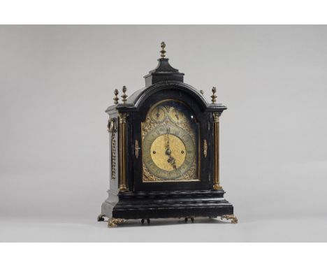 A late Victorian giltmetal-mounted ebonised three train quarter-chiming mantel clockCirca 1890The broken arched case surmount