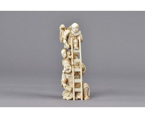 A Japanese ivory okimono, Meiji period, carved as a seated Daikoku holding a ladder, one child clambering up his back, anothe