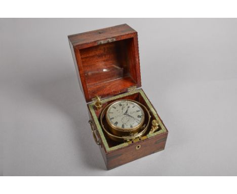 A mahogany brass-bound two-day marine chronometer By John Clarke, Greenock, No. 628, Circa 1840The three-tier case with hinge