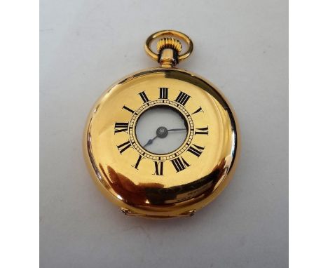 A gold cased, keyless wind, half hunting cased lady's fob watch, with an unsigned gilt jewelled cylinder movement, the gold i