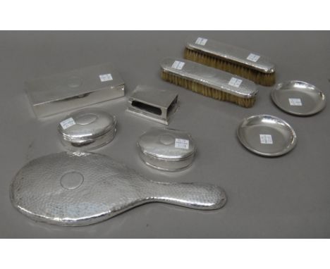 A group of silver mounted dressing table wares, comprising; a rectangular hinge lidded box, having four compartments, London 