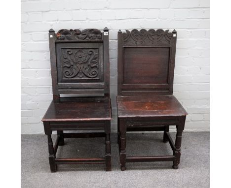 A 17th century oak side chair with carved floral panel back and solid seat on turned supports, united by perimeter stretcher,