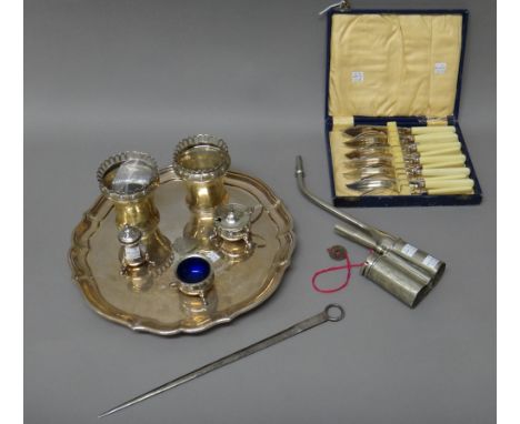 A silver skewer, crest engraved, London 1837, two similar silver vases, each decorated with a pierced gallery above a border 