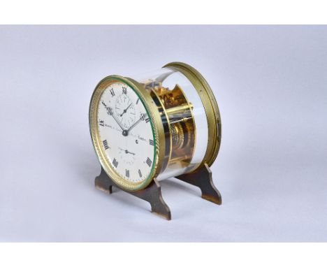 A brass and glass-cased eight-day mantel chronometerBy Thomas Adams, 36 Lombard Street, London, circa 1855, the glazed case a