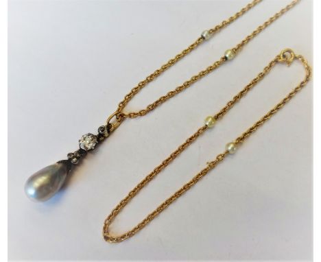 A gold backed and silver set diamond and cultured pearl pendant necklace, claw set with the principal cushion shaped diamond 