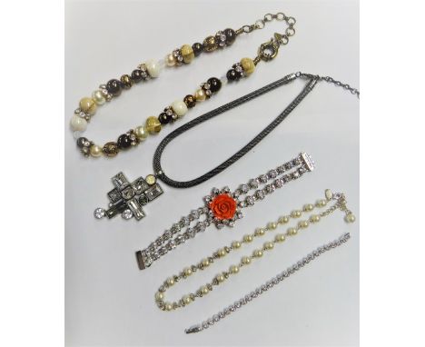 A Prada colourless gem bracelet with a salmon coloured ceramic rose motif to the centre, a Bulatti necklace spaced with beads