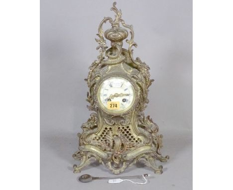 A French Louis XVI style metal mantel clock, with urn finial, enamel dial, eight-day two train movement with countwheel strik