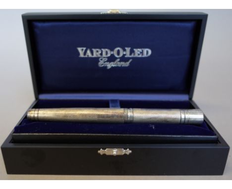 A Yard-O-Led silver cased fountain pen with engine turned case, hallmarked, Birmingham 2001, cased. 