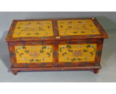A 20th century painted hardwood lift top trunk, 97cm wide x 47cm high. 