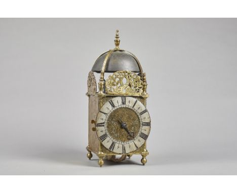 A brass lantern clockBy Henry Lintott, Farnham, 18th Century and with later elementsSurmounted by a bell, with four straps an