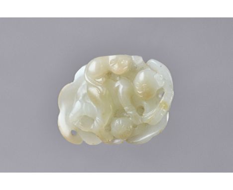 A Chinese pale celadon jade plaque, 19th/20th century, pierced and carved with a boy lying on a leaf with a cat beside, 5cm. 