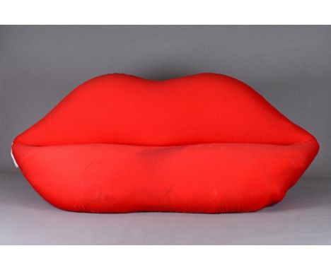 After the design, a Studio 65 Marilyn Bocca lip sofa, 1972 design for Gufram, 215cm wde x 90cm high. Illustrated. 