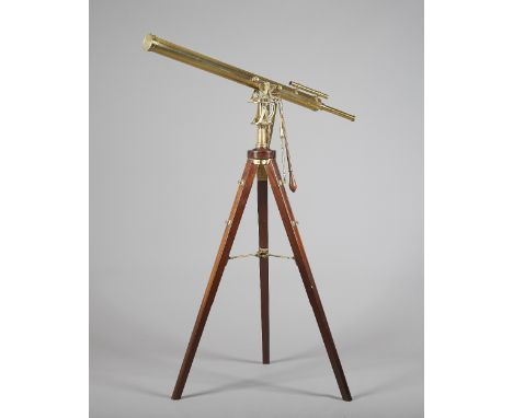 A brass cased 3 inch refracting telescope by Dollond, c.1820, celestial ring mount, stabilizing bar and wooden plane adjustin