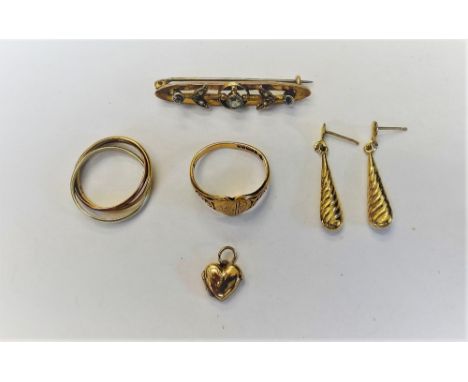 A gold, seed pearl and pale blue gem set bar brooch, a 9ct three colour gold triple band Russian style wedding ring, a 9ct go