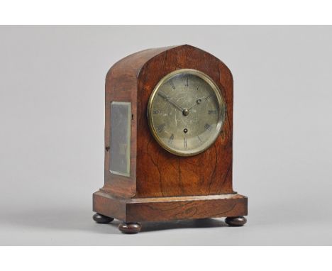 A Victorian lancet-shaped rosewood mantel timepieceBy De La Salle & Christie, London, circa 1840The case with a glass panel t